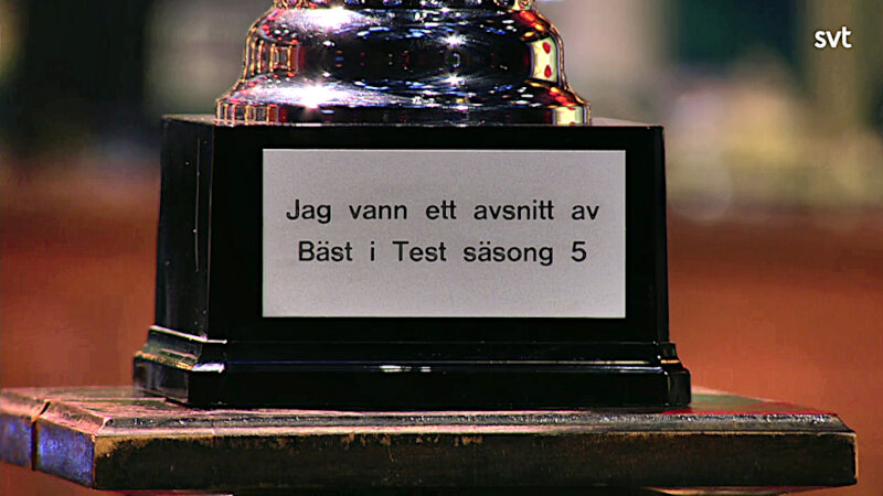Image of the prize up for grabs in this episode: a trophy engraved with the text Image of the prize up for grabs in this episode: a trophy engraved with the text