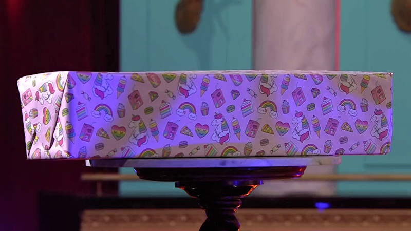 Image of the prize in this episode: the unopened third package from the ‘Create an entertaining gameshow’ task. Image of the prize in this episode: the unopened third package from the ‘Create an entertaining gameshow’ task.