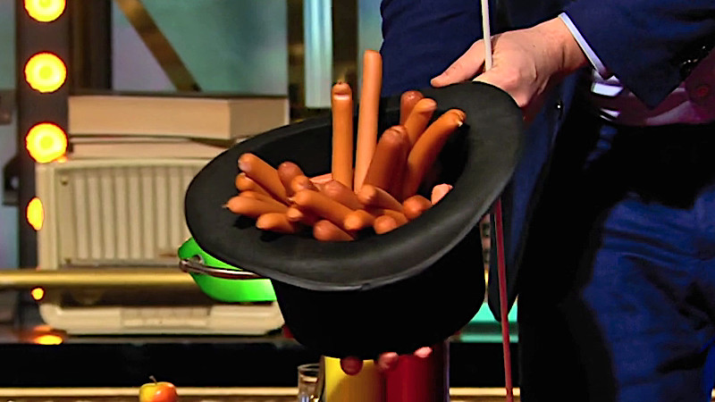 Image of the prize in this episode: a top hat containing 84 sausages, as featured in the ‘Know the most facts about sausages’ task. Image of the prize in this episode: a top hat containing 84 sausages, as featured in the ‘Know the most facts about sausages’ task.