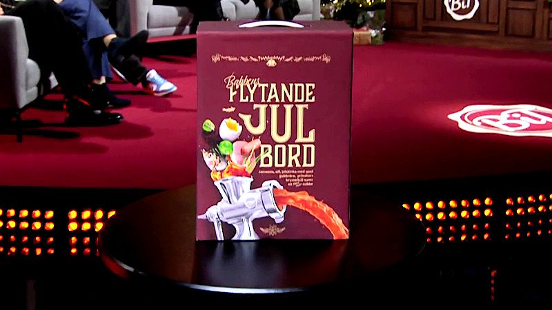 Image of the prize in this episode: a box of ‘Babben’s Liquid Christmas Dinner’, which purportedly contains everything one might expect from a traditional Swedish Christmas dinner. Image of the prize in this episode: a box of ‘Babben’s Liquid Christmas Dinner’, which purportedly contains everything one might expect from a traditional Swedish Christmas dinner.