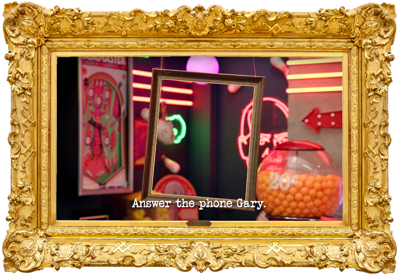 Image of a picture frame hanging from the ceiling of the study (taken during Anne Edmonds' attempt at the 'Write and perform a jingle for a small business' task), with the episode title, 'Answer the phone Gary', superimposed on it. Image of a picture frame hanging from the ceiling of the study (taken during Anne Edmonds' attempt at the 'Write and perform a jingle for a small business' task), with the episode title, 'Answer the phone Gary', superimposed on it.
