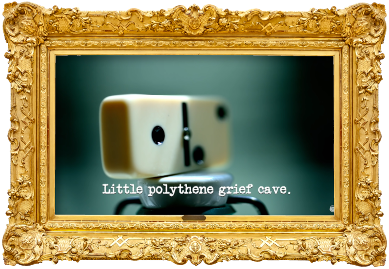Image of a domino balanced on top of something (taken during the 'Make the best domino rally' task), with the episode title, 'Little polythene grief cave', superimposed on it. Image of a domino balanced on top of something (taken during the 'Make the best domino rally' task), with the episode title, 'Little polythene grief cave', superimposed on it.