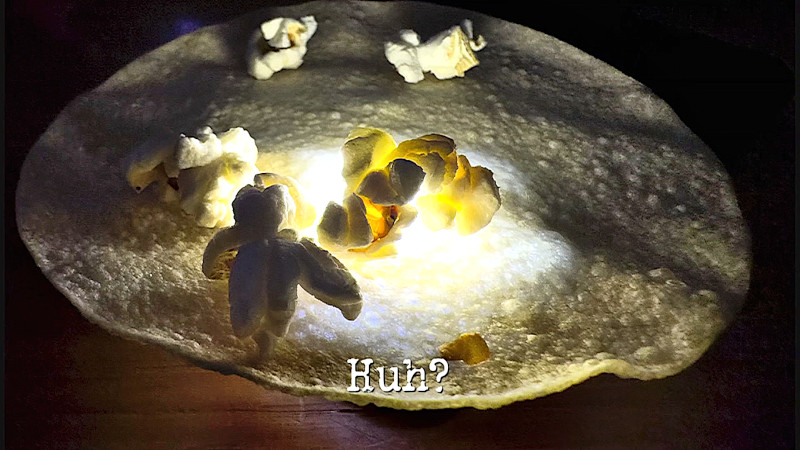 Photo of some pieces of popcorn on top of a poppadom (a reference to the 'Eat the poppadoms while complimenting Greg or insulting Alex' and 'Make everything pop at the same time' tasks), with the episode title, 'Huh?', superimposed on it. Photo of some pieces of popcorn on top of a poppadom (a reference to the 'Eat the poppadoms while complimenting Greg or insulting Alex' and 'Make everything pop at the same time' tasks), with the episode title, 'Huh?', superimposed on it.