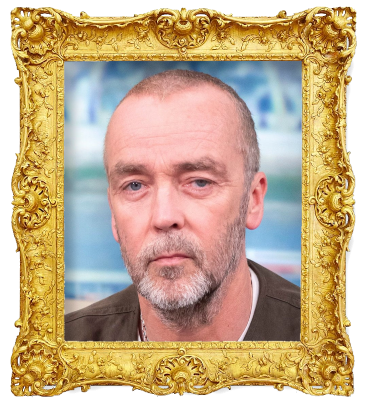 Headshot photo of John Hannah surrounded with an ornate golden frame. Headshot photo of John Hannah surrounded with an ornate golden frame.