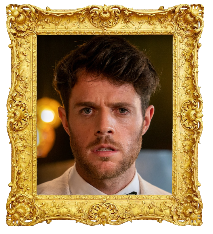 Headshot photo of Paul Williams surrounded with an ornate golden frame.