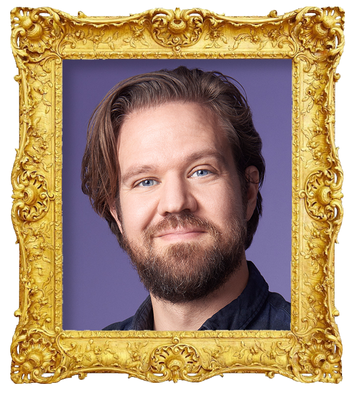 Headshot photo of Thomas Warberg surrounded with an ornate golden frame. Headshot photo of Thomas Warberg surrounded with an ornate golden frame.