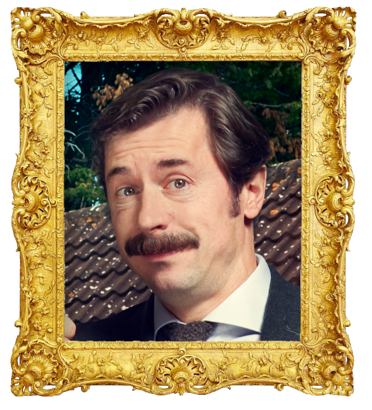 Headshot photo of Mike Wozniak surrounded with an ornate golden frame. Headshot photo of Mike Wozniak surrounded with an ornate golden frame.