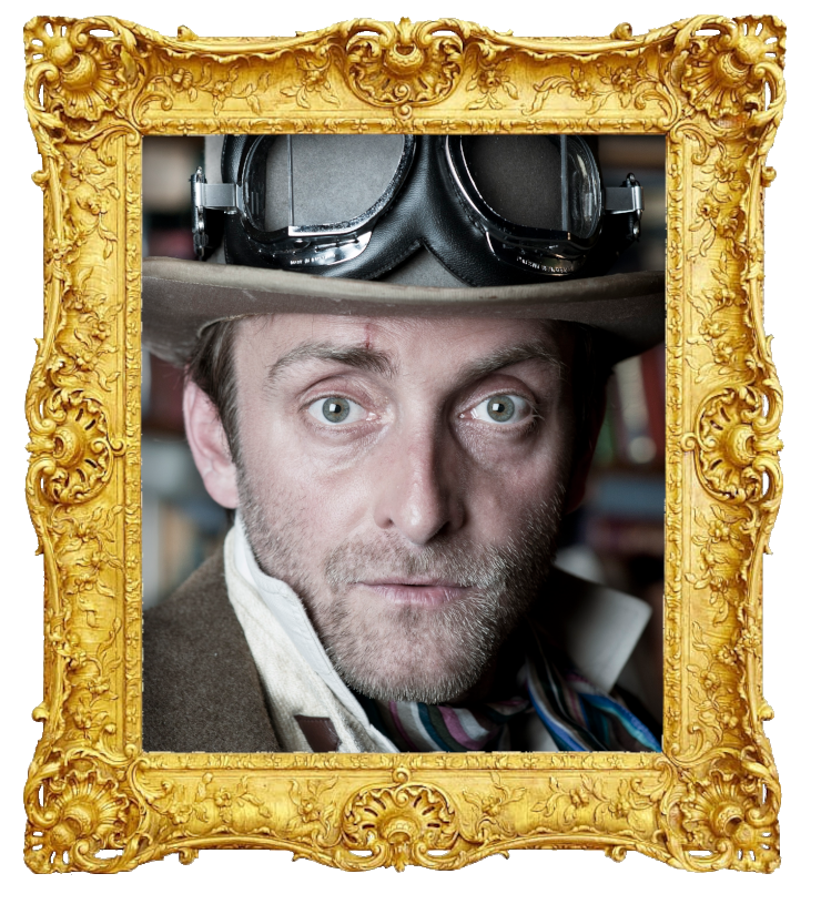Headshot photo of Tim Fitzhigham surrounded with an ornate golden frame.