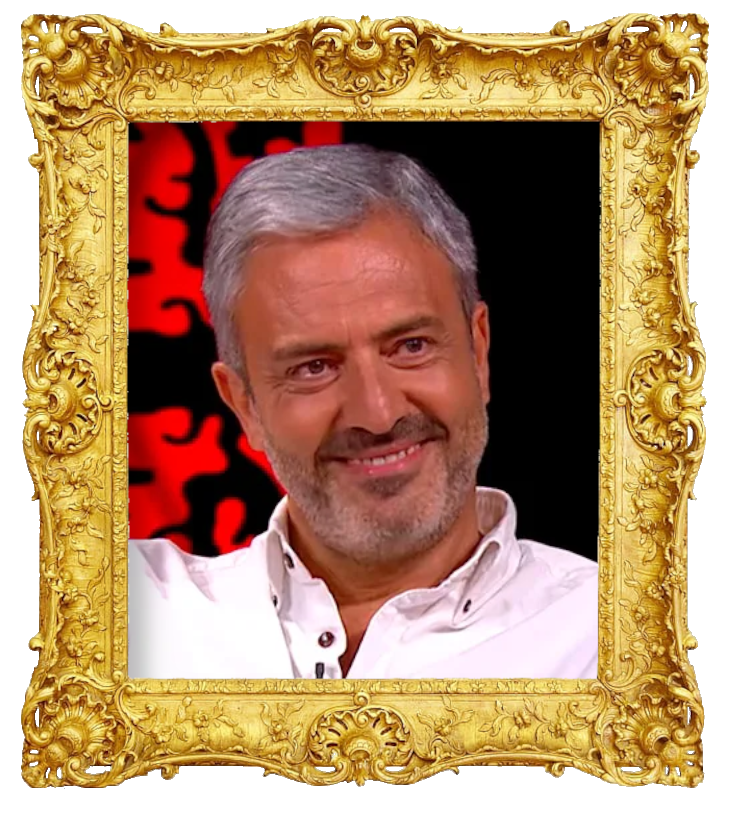 Headshot photo of Carlos Daniel surrounded with an ornate golden frame. Headshot photo of Carlos Daniel surrounded with an ornate golden frame.
