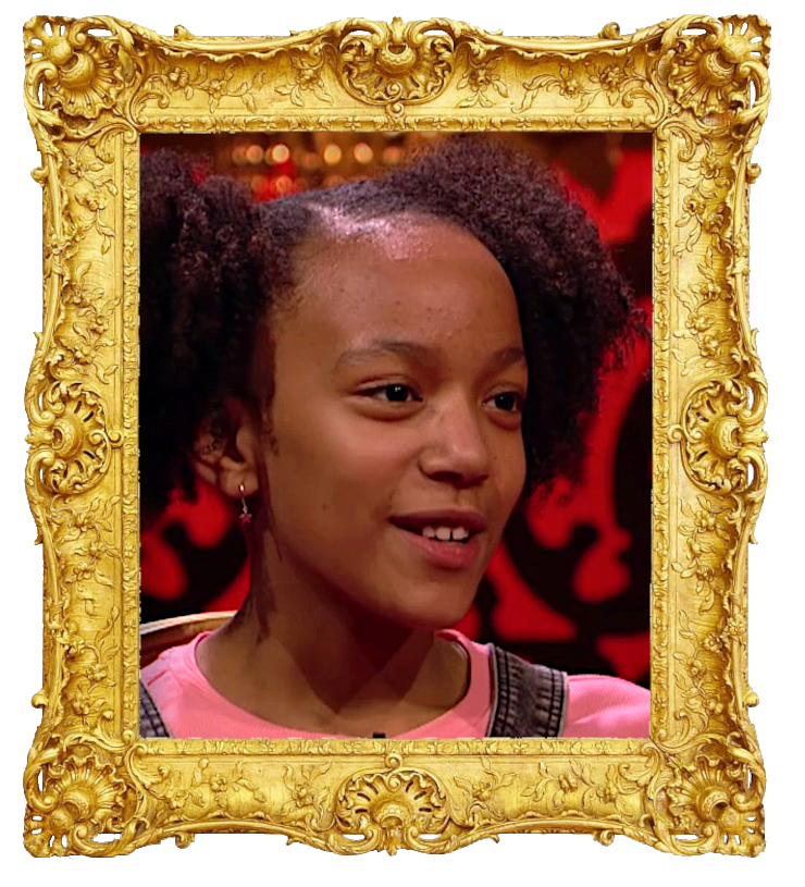 Headshot photo of Cyra surrounded with an ornate golden frame. Headshot photo of Cyra surrounded with an ornate golden frame.