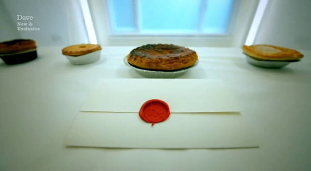 Sealed task brief lying on the lab table in front of four pies with varying shapes, sizes and crusts. Sealed task brief lying on the lab table in front of four pies with varying shapes, sizes and crusts.