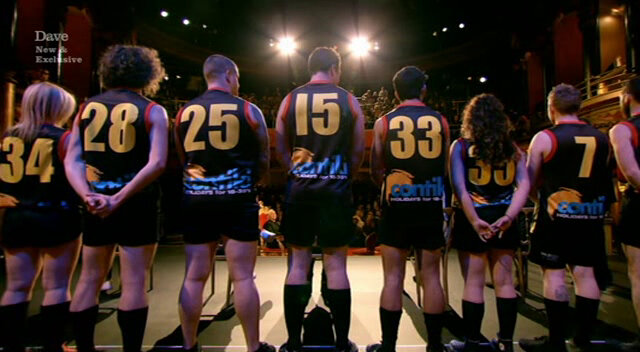 Image of the backs of about half the members of an Australian Rules Football team. Image of the backs of about half the members of an Australian Rules Football team.