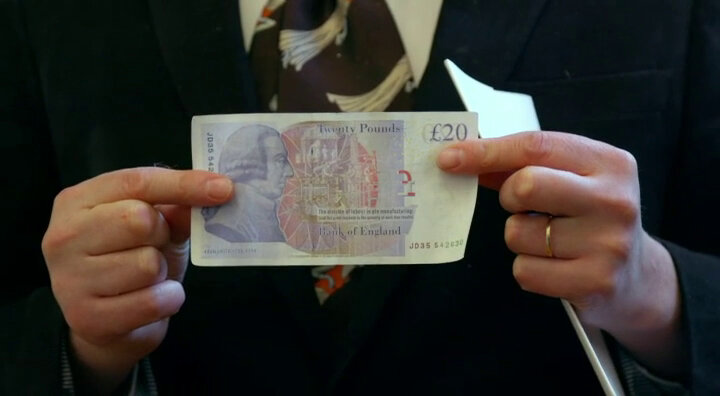 A twenty pound note held to camera pinched between Joe Wilkinson's fingers. A twenty pound note held to camera pinched between Joe Wilkinson's fingers.