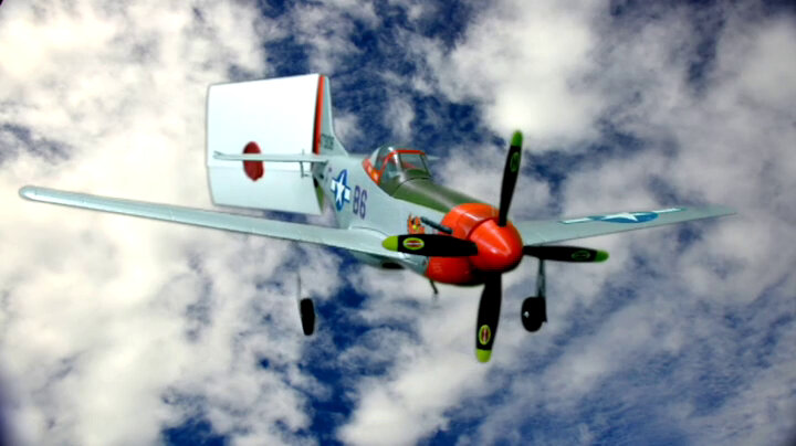Sealed task brief attached to a model aeroplane made to look as if it's flying through clouds. Sealed task brief attached to a model aeroplane made to look as if it's flying through clouds.