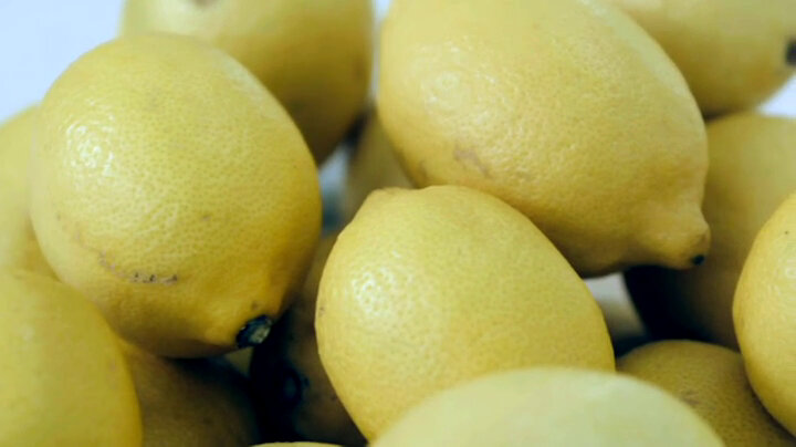 Close-up of a pile of lemons. Close-up of a pile of lemons.