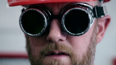 Alex Horne wearing a helmet and dark goggles.