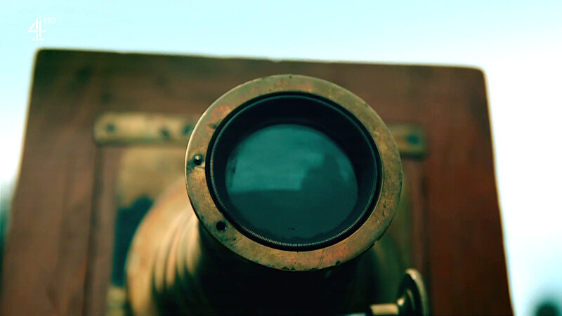 Close-up on an old-fashioned camera lens. Close-up on an old-fashioned camera lens.