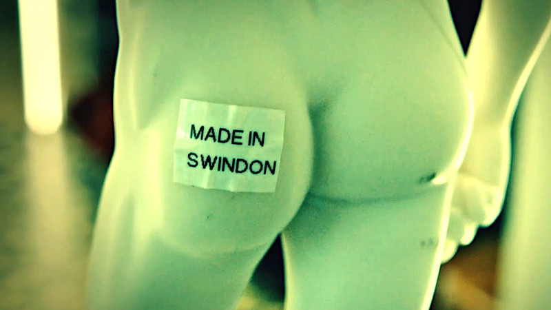 The back of a statue of Michelangelo's David. A sticker that says 'Made in Swindon' is on his left butt cheek. The back of a statue of Michelangelo's David. A sticker that says 'Made in Swindon' is on his left butt cheek.