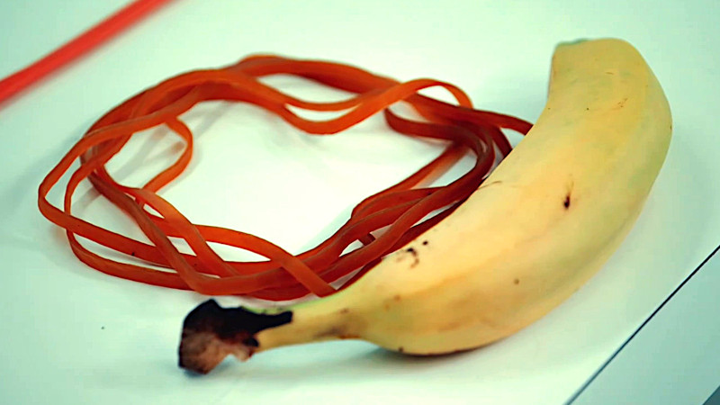 A banana and some candy rope on the lab table. A banana and some candy rope on the lab table.