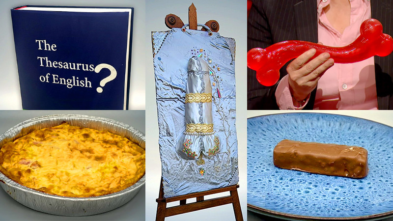 A composite image composed of five sections, featuring: a thesaurus with a question mark pasted on the front; a baked dish in a pie tin; a large multi-media art piece of a silver phallus; a red rubber dog toy shaped like a twisty bone; and a chocolate covered candy bar on a blue plate. A composite image composed of five sections, featuring: a thesaurus with a question mark pasted on the front; a baked dish in a pie tin; a large multi-media art piece of a silver phallus; a red rubber dog toy shaped like a twisty bone; and a chocolate covered candy bar on a blue plate.