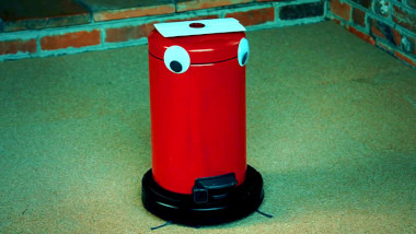 The task brief on top of a rubbish robot.