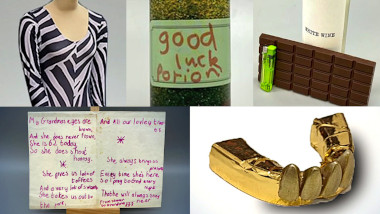 A composite image composed of five sections. In each section is a different object brought in for the prize task. Clockwise from the top left the objects are: a zebra print onesie for an adult brought in by Sophie Willan; a good luck potion brought in by Nick Mohammed (a gloopy-looking liquid in a glass jar labelled 'good luck potion' in a childish handwriting, with a green ribbon); a granny care package brought in by John Robins, consisting of a large bar of chocolate, a green disposable lighter and a bottle of white wine that simply says 'white wine'; a birthday card sent by Steve Pemberton to his grandmother when he was 8, which features a handwritten poem; and a gold grill with only four teeth in the front, brought in by Joanne McNally.