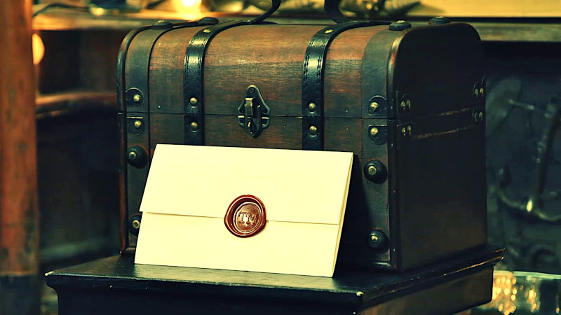 The task brief laid against a wooden box on a plinth. The task brief laid against a wooden box on a plinth.